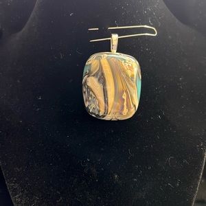 Amulet in resin